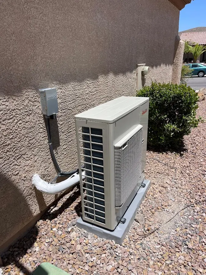 Residential air conditioning condenser unit in West Modesto